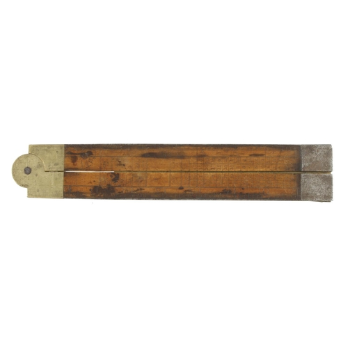210 - An 18c boxwood and brass plumber's rule with steel tips and folding brass arm, the word 