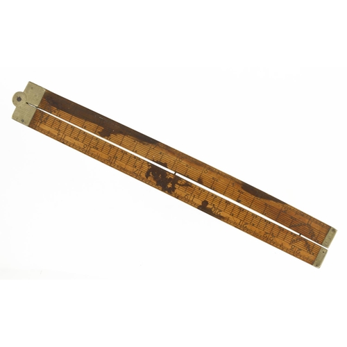 839 - An 18c 2' two fold boxwood and brass Coggeshall slide rule with surveyor's quadrants verso, ink stai... 