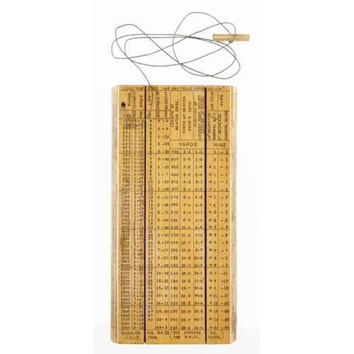 A rare 6" x 3" boxwood gunnery double slide rule by J.D. & S. dated 1938 Mk 111 with numerous scales incl. Vickers Machine Guns, Ammn, Ranges, Yards Mins, Air Temp, Baro, Width of Beaten Zone & Cone, Range of Troops etc etc c/w the orig 24" cord and peg for graticule purposes F