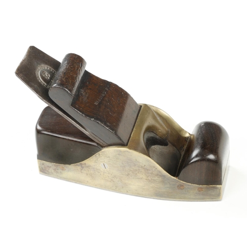 870 - A nice quality steel soled gunmetal smoother with rosewood infill and scrolled wedge and 2