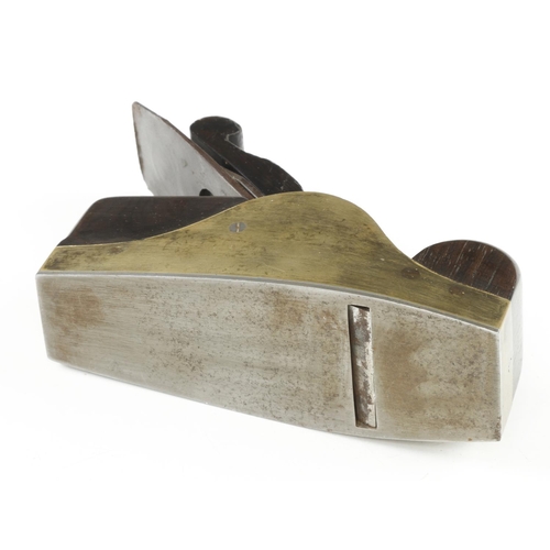 870 - A nice quality steel soled gunmetal smoother with rosewood infill and scrolled wedge and 2