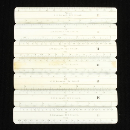 942 - A set of 7 ivory scale rules by J.H.STEWARD in orig poor card case G++