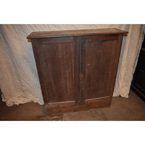 165 - An antique pine tool cupboard                                    


Subject to VAT