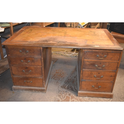 314 - An oak office desk                                                            


Subject to VAT