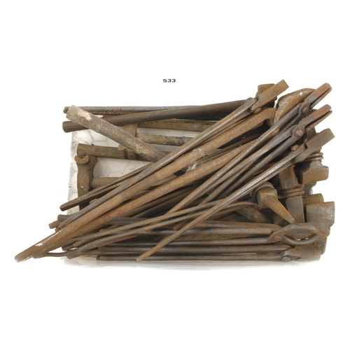 533 - A large quantity of blacksmith's pincers, hammers, chisels etc G