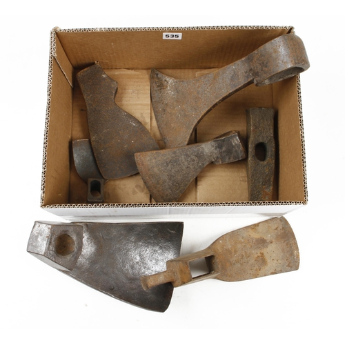 535 - An adze head, two bowl adze heads and 3 axe heads G