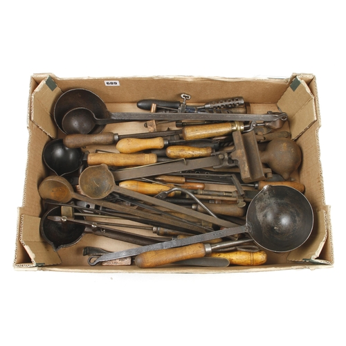 689 - Eight lead pouring ladles and various soldering irons etc G