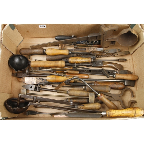 689 - Eight lead pouring ladles and various soldering irons etc G