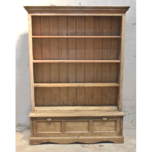 75 - A pine bookcase                                                              

Subject to VAT