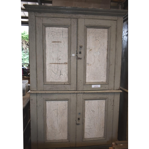 77 - A double door pine tool cupboard 87