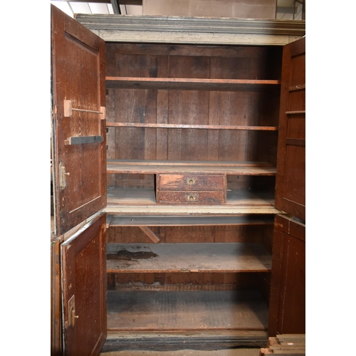 77 - A double door pine tool cupboard 87