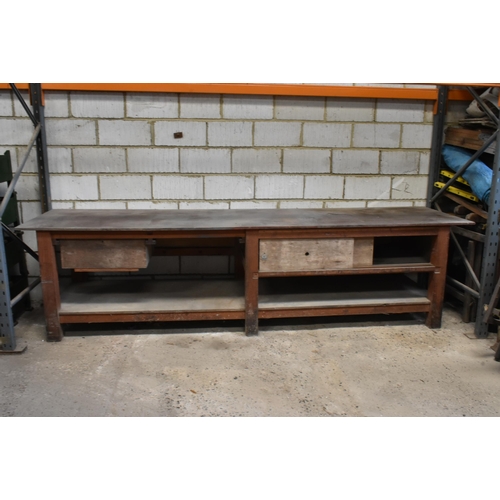 79 - A heavy duty pine framed workbench 132