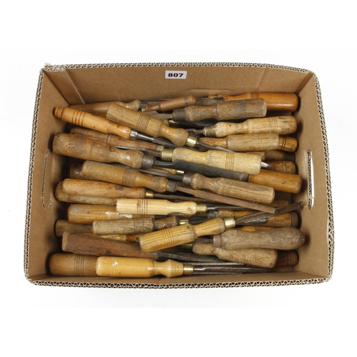 807 - 50 old chisels and gouges G-