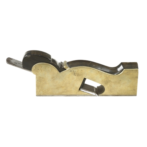 852 - A heavy brass shoulder plane with thick steel sole and ebony infill and wedge with full 1 1/2