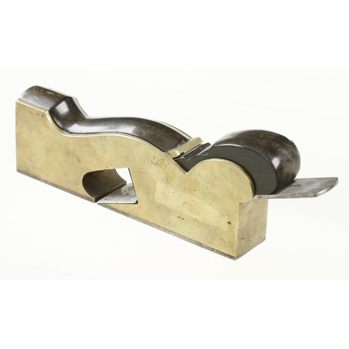 852 - A heavy brass shoulder plane with thick steel sole and ebony infill and wedge with full 1 1/2