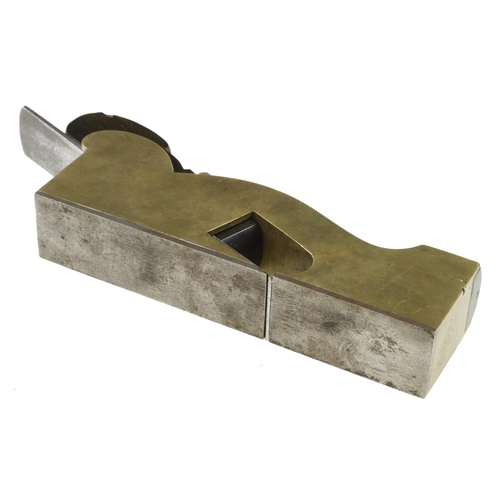 852 - A heavy brass shoulder plane with thick steel sole and ebony infill and wedge with full 1 1/2