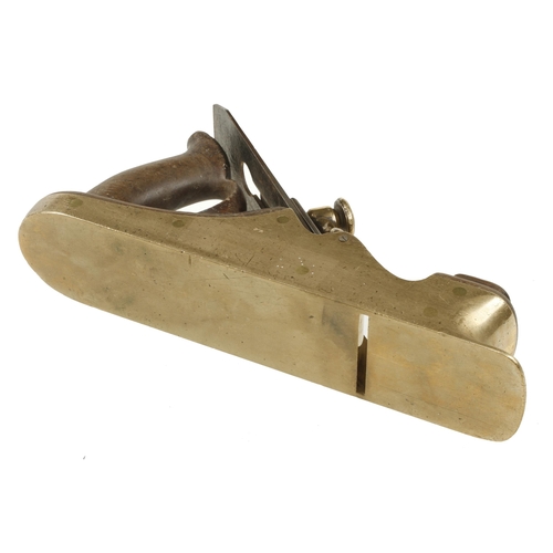 865 - A nice quality Scottish style brass smoother 11