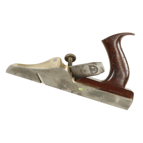 874 - A nice quality steel faced brass shouldering plane with mahogany? infill and handle G+