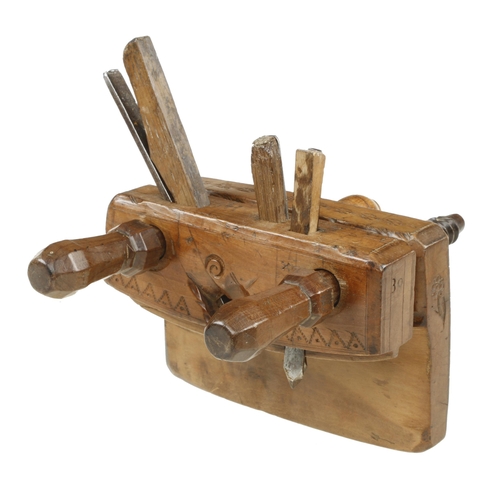 910 - An early fruitwood Austrian cooper's croze dated G.P.1787 with other decoration, the clamping screw ... 