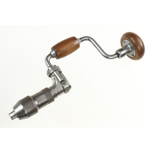 912 - An unusually small ratchet brace by J.A.CHAPMAN Sheffield with mahogany head and handle G+