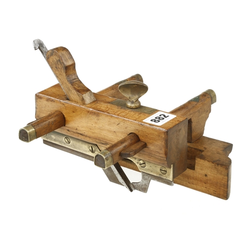 882 - A rare coachmaker's beech plough plane with set of with 7 slender irons by Ibbotson, wedge replaced ... 