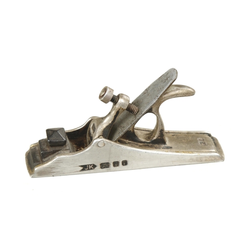 886 - A miniature silver plane 2