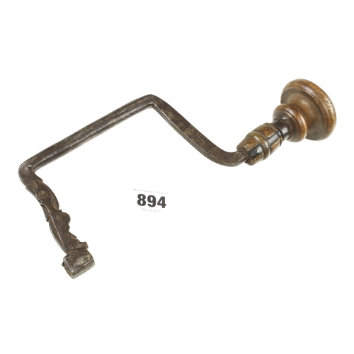 894 - A 17/18c Scandinavian iron brace with elaborate spring to hold the bit G