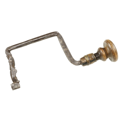 894 - A 17/18c Scandinavian iron brace with elaborate spring to hold the bit G