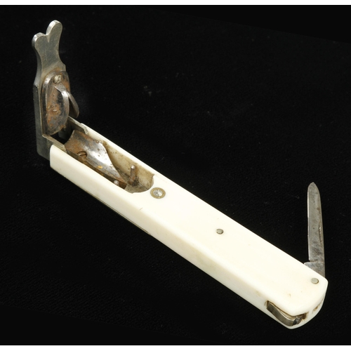 914 - An ivory quill cutter by THORNHILL with German silver fittings G+