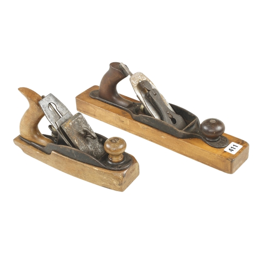 411 - Two wood bottom planes, one with replaced lever G