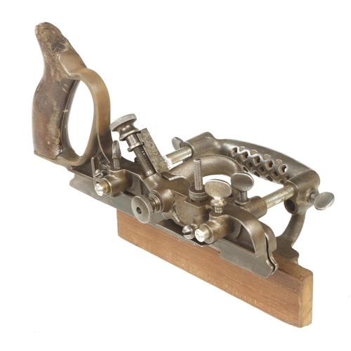 605 - A SARGENT No 1080 combination plane with 19 cutters G