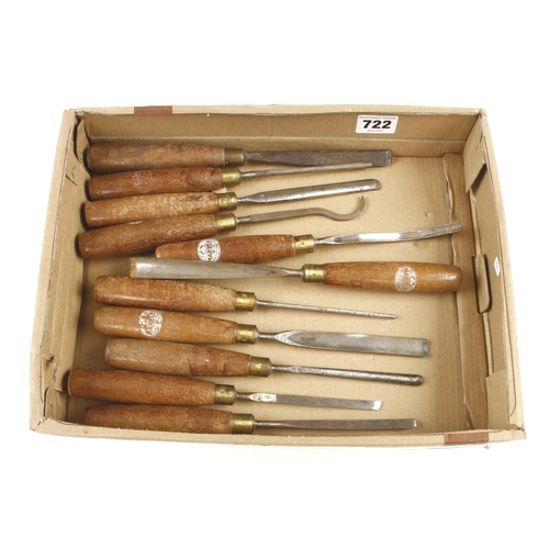 722 - A set of 11 carving tools by MARPLES with mahogany handles G