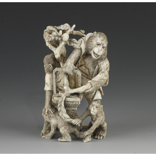 905 - An ivory okimono of a group of 4 monkeys picking fruit into a basket 4