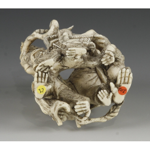 905 - An ivory okimono of a group of 4 monkeys picking fruit into a basket 4