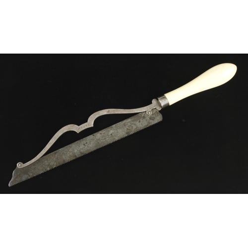 931 - A plated surgeon's saw with fancy frame and ivory handle 14