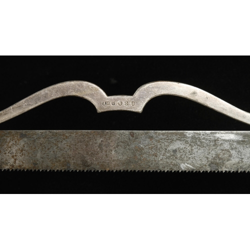 931 - A plated surgeon's saw with fancy frame and ivory handle 14