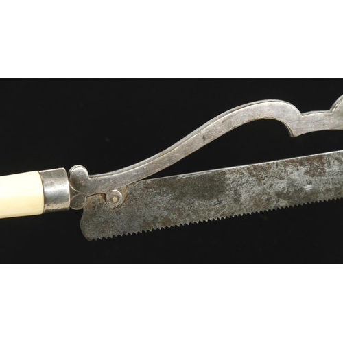 931 - A plated surgeon's saw with fancy frame and ivory handle 14