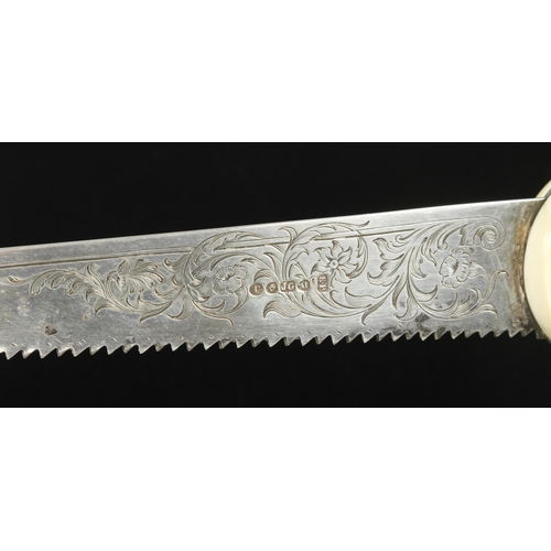 932 - A beautifully decorated saw engraved CORNEY Oswestry with ivory handle and 11