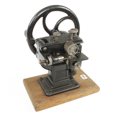 130 - A leather skiving machine marked DRP DIXI with instructions for use on brass plaque G+