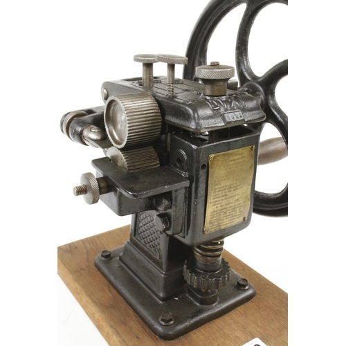 130 - A leather skiving machine marked DRP DIXI with instructions for use on brass plaque G+