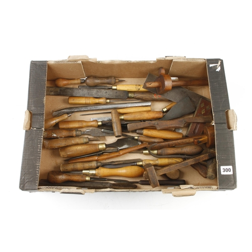 300 - A box of chisels and other tools G