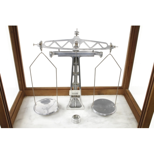 31 - A scientific balance in glass cabinet with marble base by PROLABO Paris (not for mailing) G+