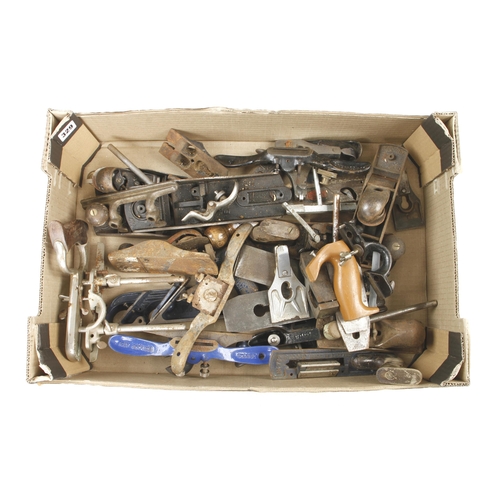 329 - A box of plane irons G-