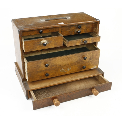 366 - An engineer's lockable 8 drawer tool chest by MOORE & WRIGHT on craftsman made base G+