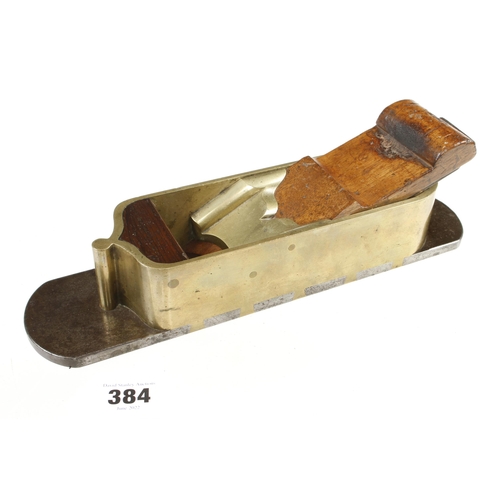 A rare, fine quality brass mitre plane 12" x 2 3/4" d/t steel sole and rosewood infill and wedge, minor pitting spots to sole G++