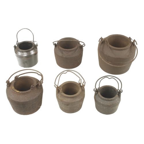 73 - Six cast iron glue pots G