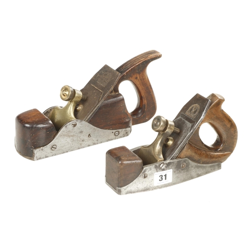 31 - Two iron smoothing planes with brass levers for restoration G