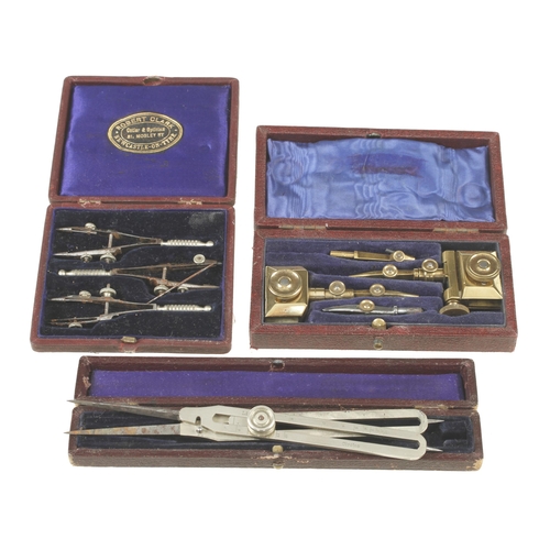 386 - A proportional divider, a set of 3 bow compasses and a set of brass trammel heads all in orig boxes ... 