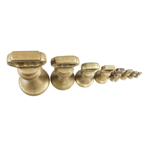 434 - A set of 8 brass bell weights 1oz to 7lbs G