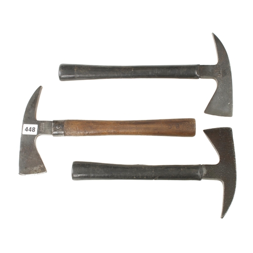 448 - An axe with handle stamped 